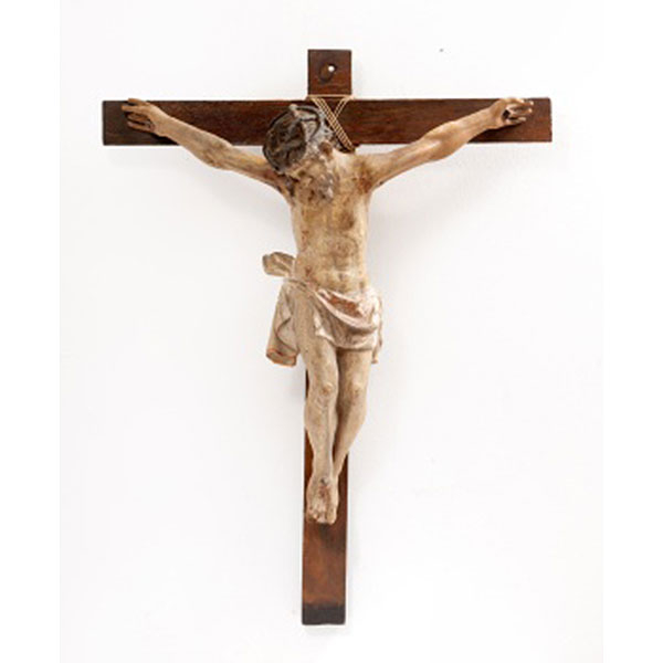 Talla en madera policromada con restos de dorado representando Cristo en la Cruz. España.