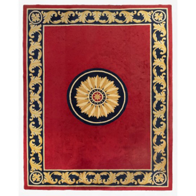 Alfombra de lana con medall&oacute;n central y greca alrededor La Alpujarrena.   S. XX