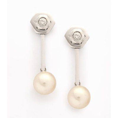 Pendientes largos desmontables en oro blanco con diamante talla brillante central