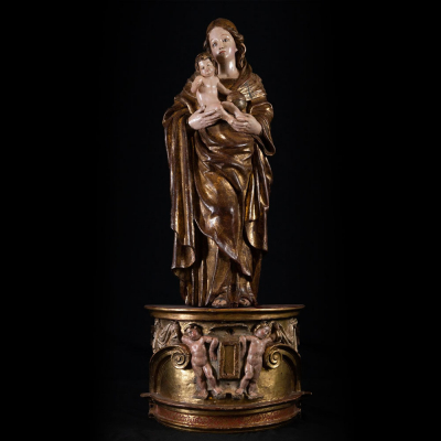 Espectacular gran "Virgen con Ni&ntilde;o" en brazos en madera de talla, escuela Romanista del siglo XVI.   