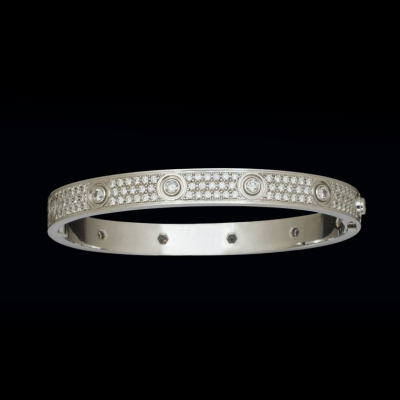 Pulsera de oro blanco de 18 K. marca CARTIER, con brillantes.