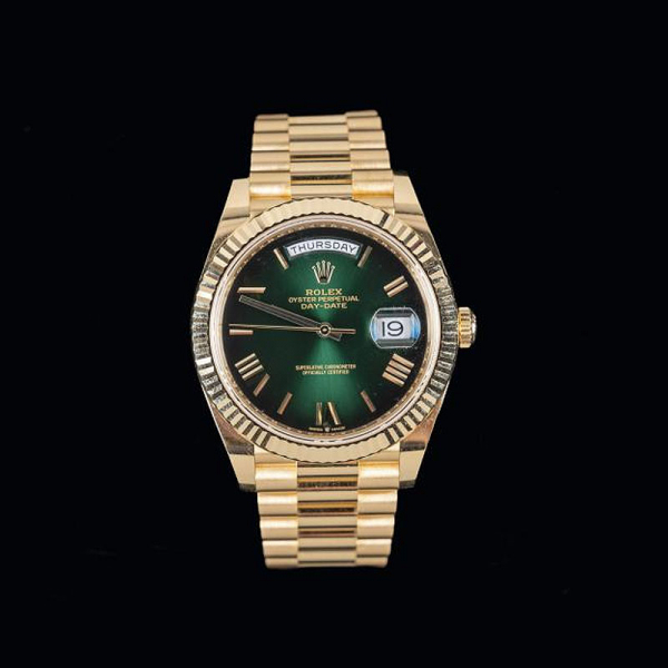 Reloj de pulsera ROLEX, modelo Oyster Perpetual Day-Date, realizado en oro amarillo de 18 K. Referencia: 22823. Número de serie: L73K7083.