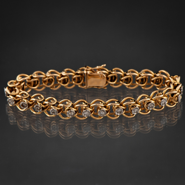 Bonita pulsera articulada en oro amarillo de 18 kt con brillantes