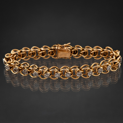 Bonita pulsera articulada en oro amarillo de 18 kt con brillantes
