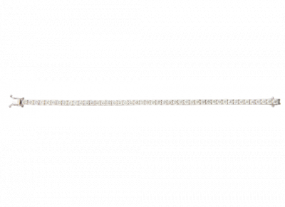 Pulsera rivi&egrave;re de 45 brillantes, engastados en garras articuladas.   En montura de oro blanco.