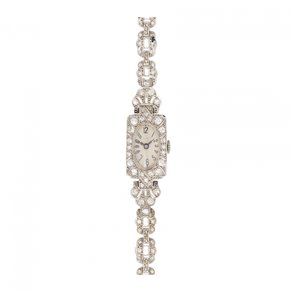 Reloj Art Deco «Dox»de pulsera para señora. En platino. Armis y bisel cuajados de diamantes tallas brillante antigua y 8/8 