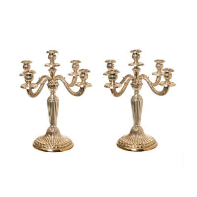 Pareja de candelabros de cinco luces en plata española punzonada 916, s.XX.