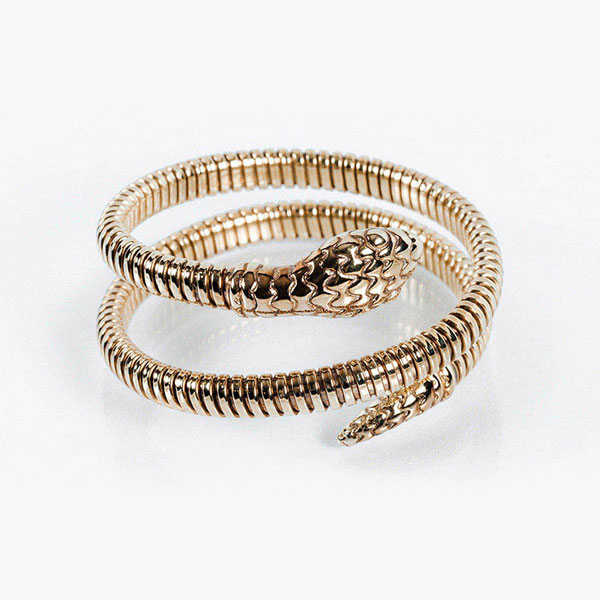 Brazalete doble tubo de gas de la firma ARISTOCRAZY, en plata de ley bañada en oro, con motivo de serpiente. Talla M.
