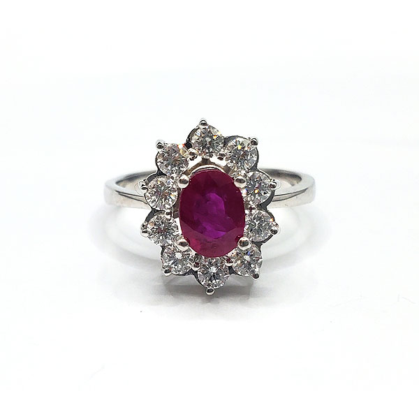 Sortija en oro blanco de 18k con diamantes y rubí