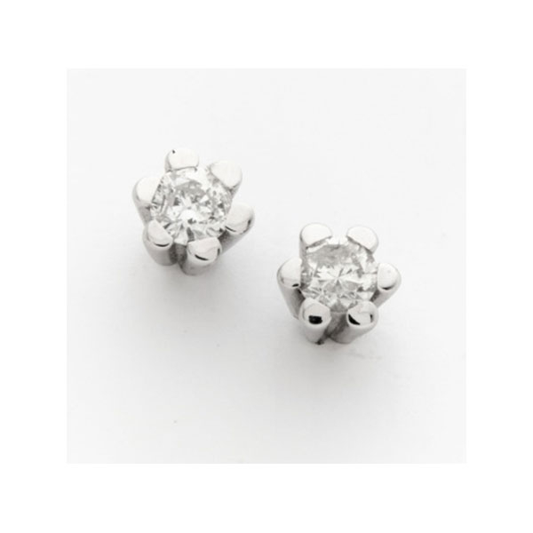 Pendientes solitarios en oro blanco representando flor con 2 diamantes talla brillante con peso total de 0,30 cts. aprox.