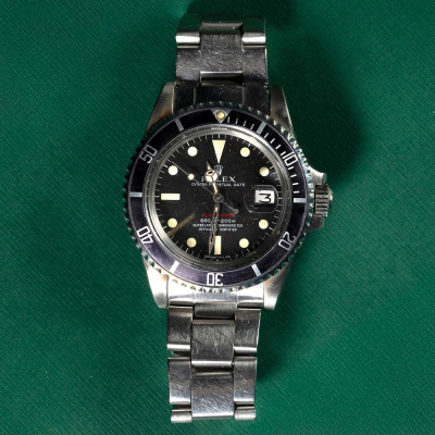 Reloj ROLEX mod. Oyster Perpetual Date Submariner Red bisel azulado Superlative Chronometer Officially Certified. Ref. 1680. Año 1969. 