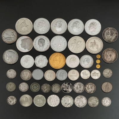 Conjunto de Monedas y Medallas conmemorativas en plata de ley 999 milésimas y plata de 900 milésimas