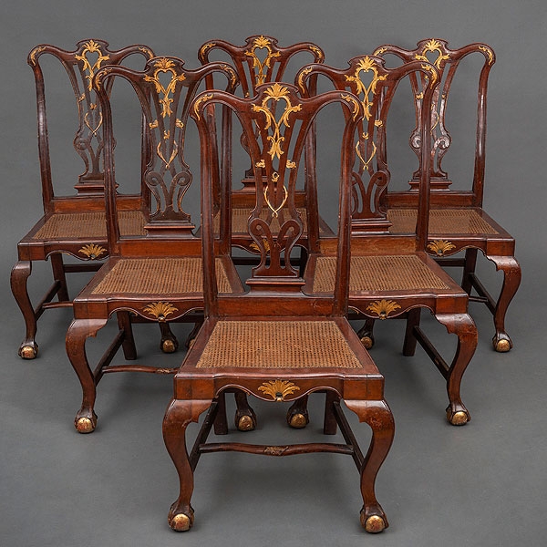 Conjunto de seis sillas estilo Chippendale en madera de nogal y dorada. Siglo XVIII.