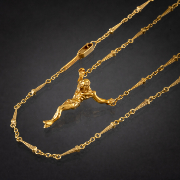 Cristo de Salvador Dalí con cadena en oro amarillo de 18 kt.