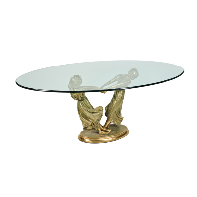 Manufactura Manuel Vidal Grau (Valencia, 1978) Mesa ovalada con sobre en cristal biselado y pie en bronce dorado con pareja de figuras femeninas danzantes.