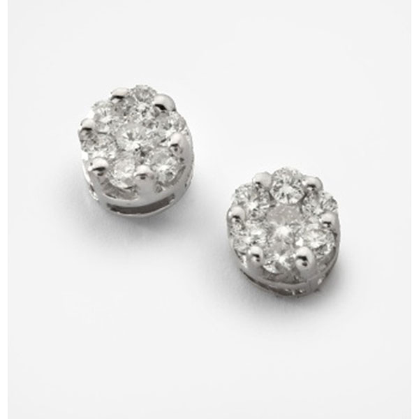 Pendientes en oro blanco con diamantes talla brillante  con un peso total de 1,1 cts. aprox., formando flor.