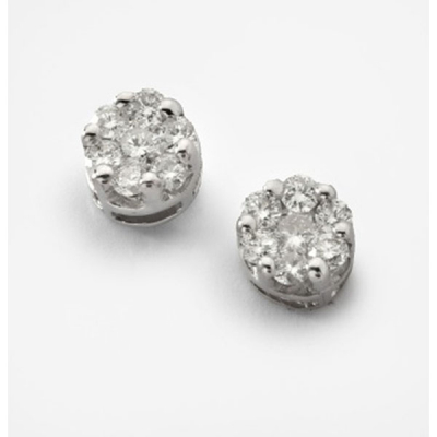 Pendientes en oro blanco con diamantes talla brillante  con un peso total de 1,1 cts. aprox., formando flor.