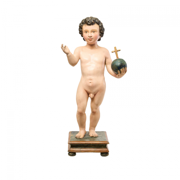 Escuela española, fles. del s.XVIII. Niño Jesús Salvador Mundi. Escultura en madera tallada y policromada sobre peana en madera.