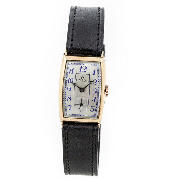 Reloj vintage, cab. suizo, OMEGA, en caja tipo &#039;tanque&#039; rectangular-curvada de oro amarillo 18 K, 