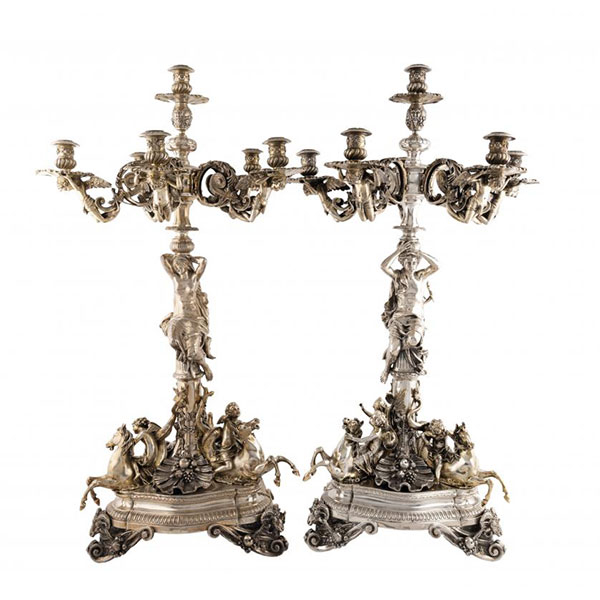 Pareja de magníficos candelabros de seis luces realizados en plata española punzonada, ley 925.
