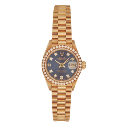 Reloj Rolex Oyster Perpetual Date Just de pulsera para señora. Ref.: 69138/R958515. En oro. Bisel y numeración de diamantes talla brillante. Esfera azul. Brazalete President. Mecanismo automático.