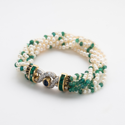 PUIG DORIA. Pulsera de ocho hilos de perlas cultivadas y cuentas de esmeralda 