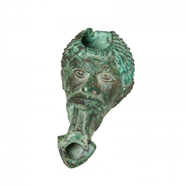 Lucerna Numidia de Negroide en bronce, Roma, s.I d.C. En buen estado de conservación.