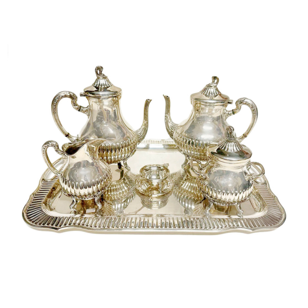 Juego de café de seis piezas en plata colombiana punzonada 900 con contrastes de la platería Florentina, Bogotá, con decoración gallonada y de acantos, s.XX.