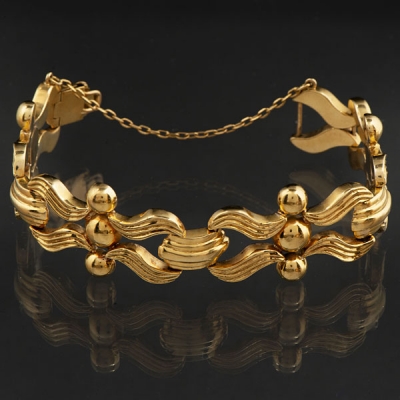 Bonita pulsera articulada en oro amarillo de 18 kt.