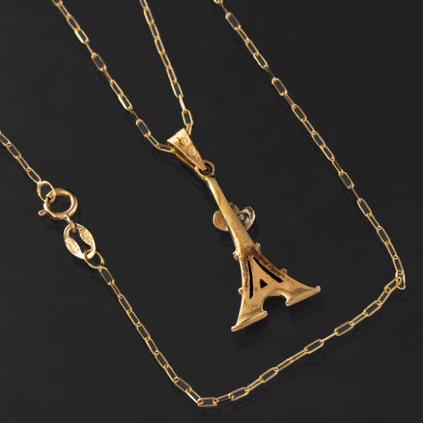 Cadena en oro amarillo de 18kt con colgante de la torre Eiffel.