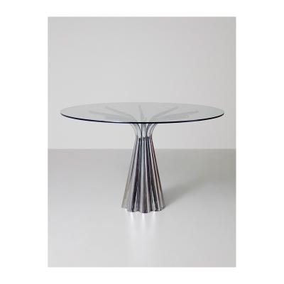 Manufactura Vidal Grau (Valencia, 1978) Mesa de estructura tubular compuesta por ocho cilindros en metal cromado sustentando el sobre en cristal circular, c.1970