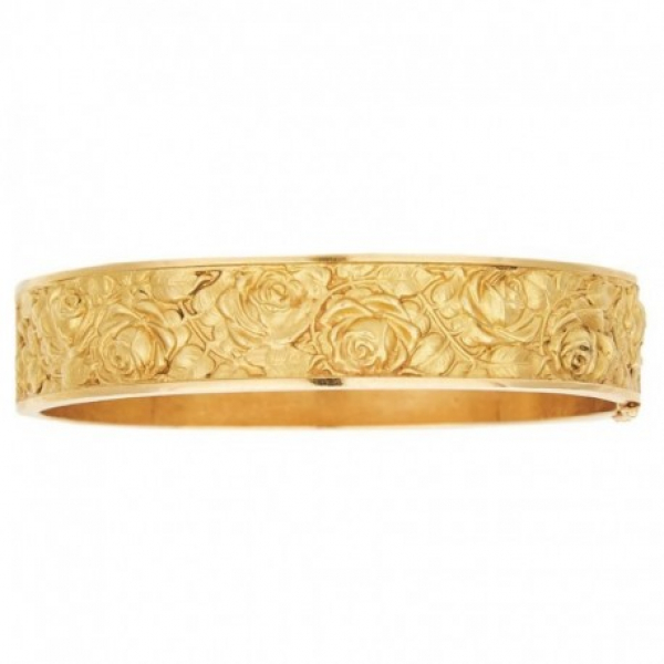 Pulsera esclava diseño oval en oro mate y brillo con decoración floral en bajo relieve.