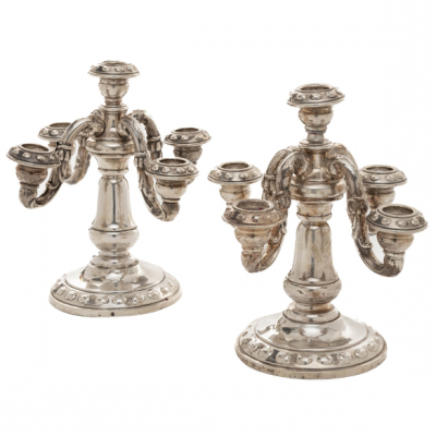 Pareja de candelabros de cinco luces en plata española y punzonada del siglo XX.