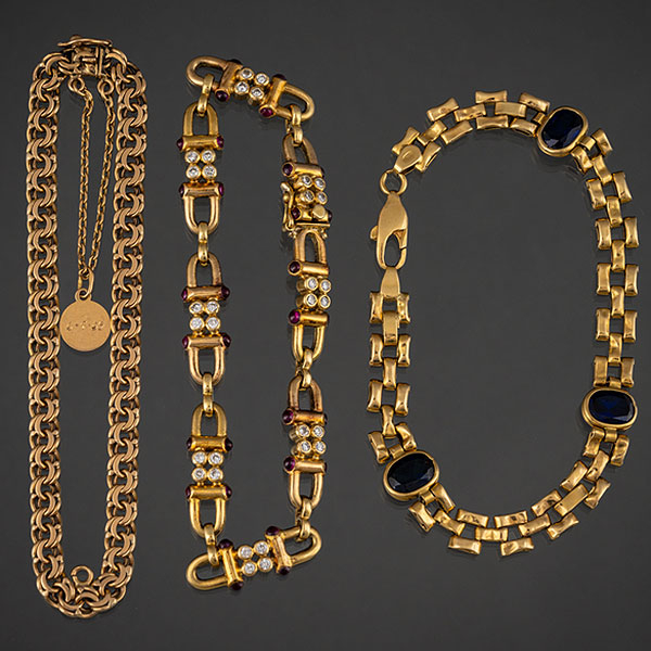 Conjunto de tres pulseras de eslabones en oro amarillo de 18kt.