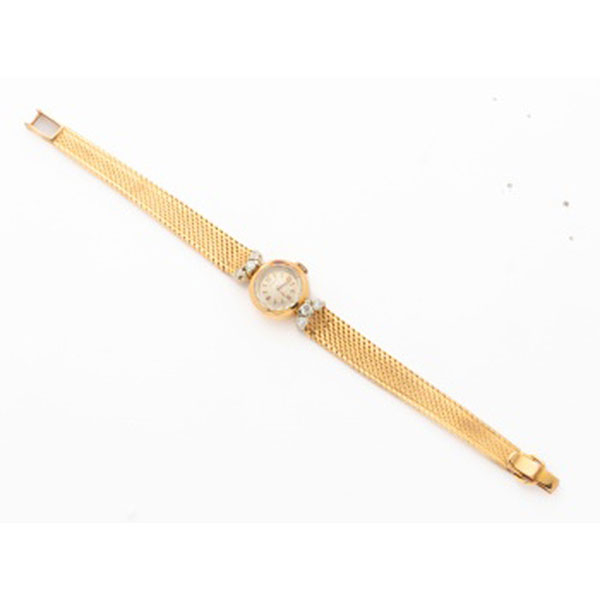 Reloj de señora marca Longines con caja y pulsera en oro amarillo y 6 diamantes talla brillante