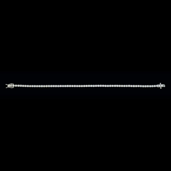 Pulsera de oro blanco de 18 K. rivière de brillantes de un peso total de 3,33 cts.