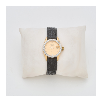 LONGINES. Reloj de pulsera para señora. En oro y correa de piel. Bisel con diamantes talla brillante.