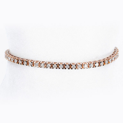 Pulsera &#039;rivière&#039; en oro rosa y frente en fila de limpios y blancos diamantes talla brillante (54 btes: 3.20 ct aprox., características estimadas: color H, pureza VS), en garras.