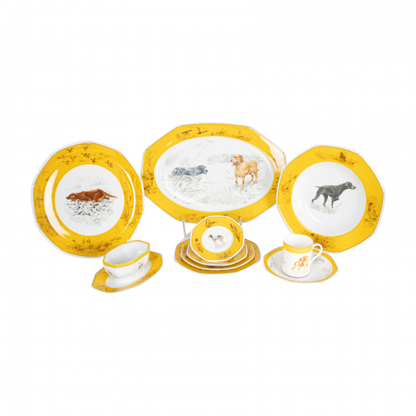 HERMÈS. Para la manufactura Limoges. Vajilla modelo «Chiens courants et chiens d’arrêt» en porcelana francesa esmaltada c.1980. 53 piezas.