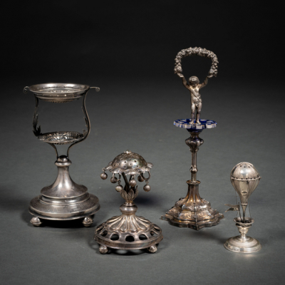 Conjunto de cuatro palilleros en plata punzonada del siglo XIX-XX.
