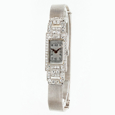 Reloj-joya de sra., &#039;art-decó&#039; PATEK PHILIPPE en caja rectangular de platino y diamantes 8/8 (66 dtes: 1.00 ct aprox.).