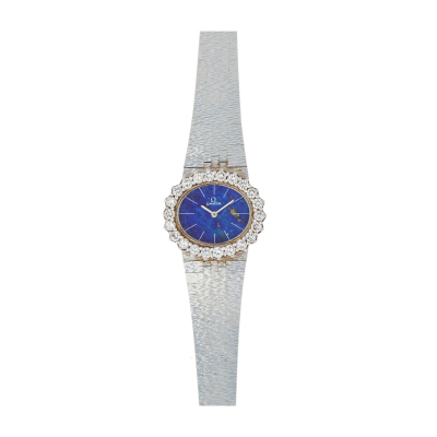 Reloj Omega para señora. En oro blanco y diamantes talla brillante. Esfera en lapislázuli 
