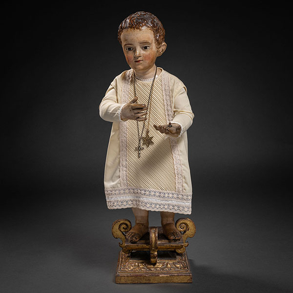"Niño Jesús" Escultura en madera tallada y policromada del siglo XVIII.