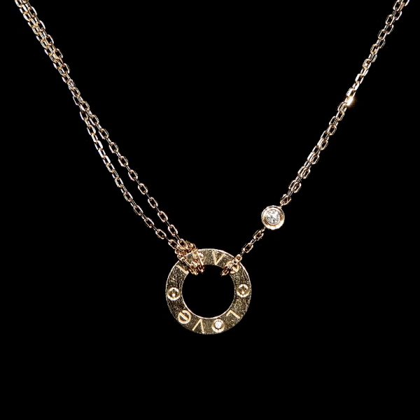 Gargantilla Cartier Love en oro rosa con diamante. 