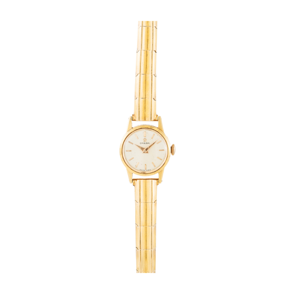 Reloj Omega de pulsera para señora. En oro. Esfera en tonalidad marfil con numeración trazos aplicados.