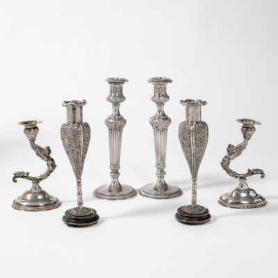 Conjunto de tres parejas de candeleros en plata espa&ntilde;ola y punzonada del siglo XX.