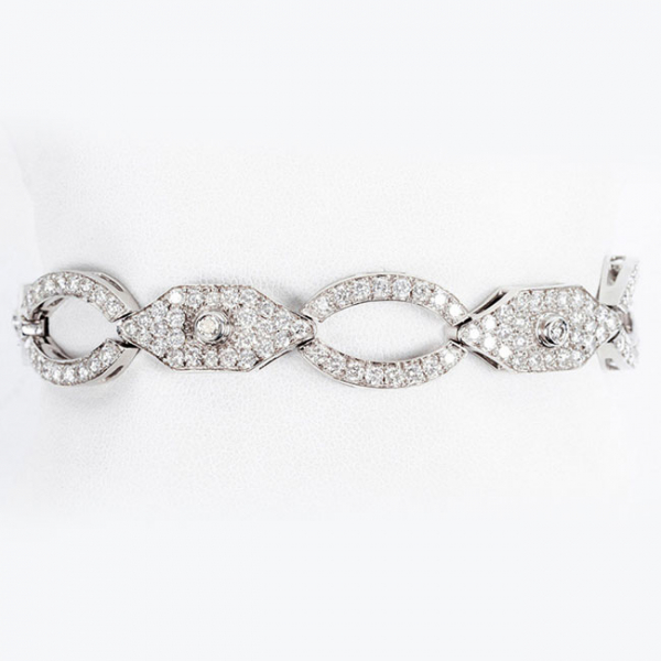 Elegante pulsera en oro blanco 18 K cuajada de limpios y blancos diamante 