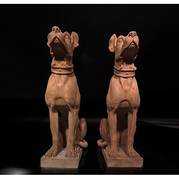 Pareja de perros en terracota, Italia, siglo XX.   Terracota. Medidas: 70 cm.