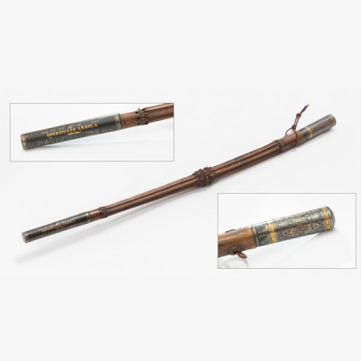 Bastón de mando con empuñadura damasquinada.  Inscripción Arriaga. Puntera representando las notas musicales del Gernicaco Arbola y escudo de Vizcaya. Época: S. XIX