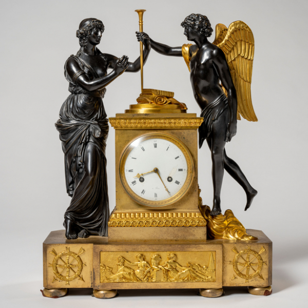 Reloj francés Imperio de sobremesa en bronce dorado y bronce pavonado del siglo XIX